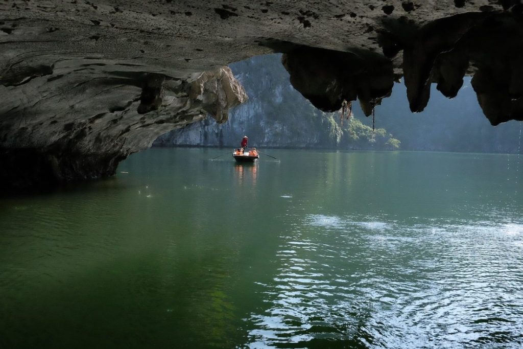Bamboo boat ride in Dark and Bright cave